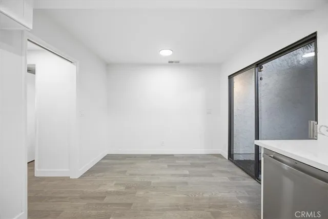 a view of a storage & utility room with a sink