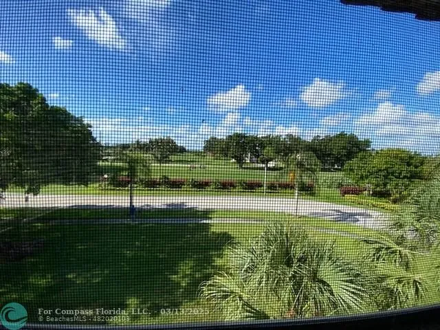 a view of building with garden