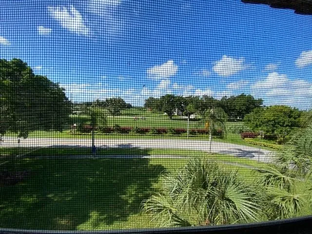 a view of walk in closet with wooden floor