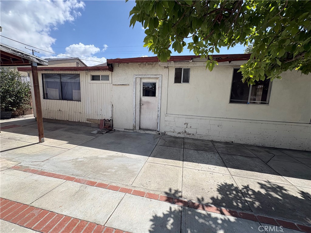 14023 Studebaker Road Norwalk, CA 90650 - Photo 26 of 33 a front view of a house with a yard