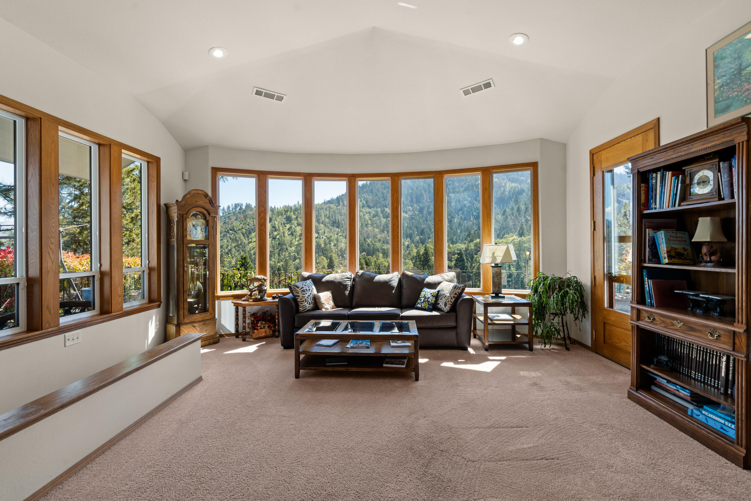 9302 Yank Gulch Road Talent, OR 97540 - Photo 13 of 37 a living room with furniture and large windows