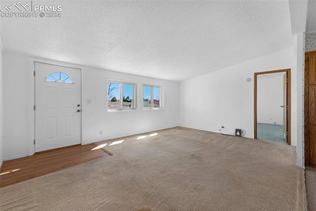 33510 Fossinger Road Yoder, CO 80864 - Photo 11 of 50 Living room entry looking toward master bedroom