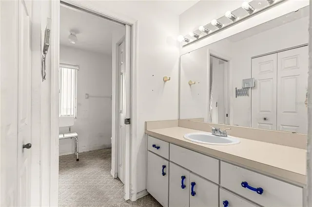 a aerial view of a house with a yard and outdoor seating