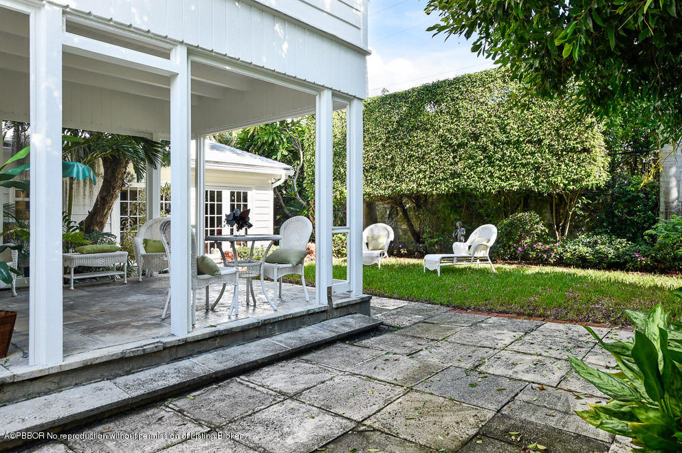 223 Orange Grove Road Palm Beach, FL 33480 - Photo 11 of 12 a view of a porch with chairs and backyard