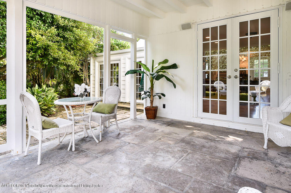 223 Orange Grove Road Palm Beach, FL 33480 - Photo 9 of 12 a view of a house with backyard and sitting area