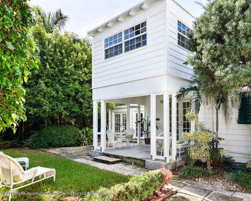 223 Orange Grove Road Palm Beach, FL 33480 - Photo 10 of 12 a view of a house with backyard and garden