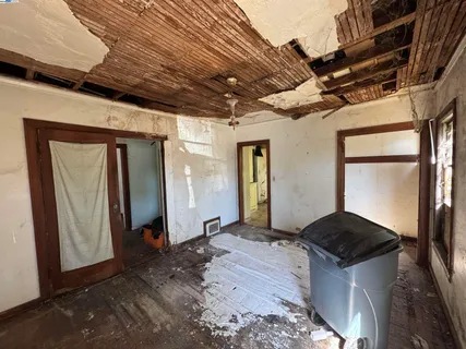 a backyard of a house with outdoor seating