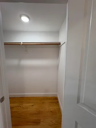 a view of small space with racks on the wall