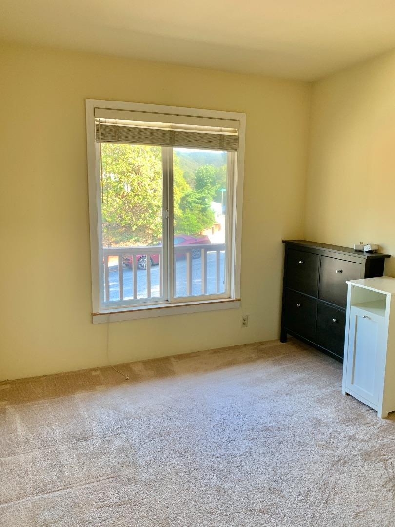 1291 Park Pacifica Avenue Pacifica, CA 94044 - Photo 13 of 18 a view of an empty room with a window