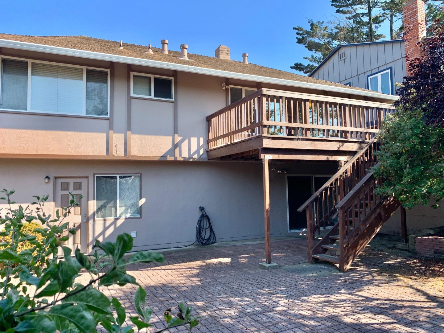 1291 Park Pacifica Avenue Pacifica, CA 94044 - Photo 17 of 18 a front view of a house with balcony
