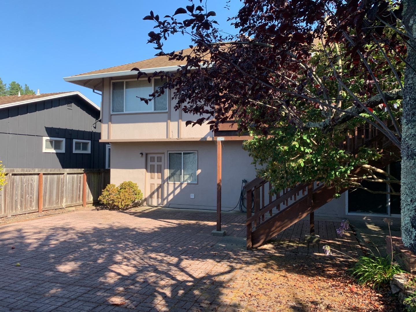 1291 Park Pacifica Avenue Pacifica, CA 94044 - Photo 18 of 18 a view of a house with a yard