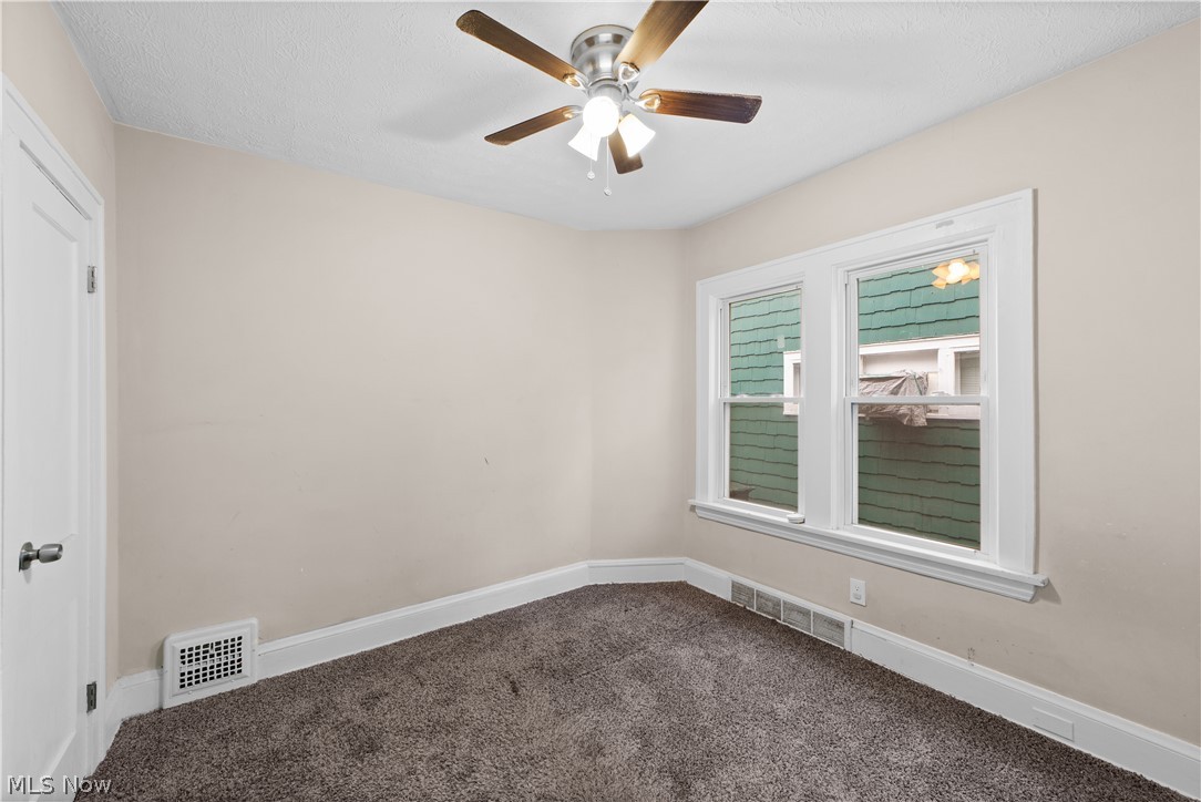 1062 Yellowstone Road Cleveland Heights, OH 44121 - Photo 16 of 29 Spare room with carpet flooring and ceiling fan