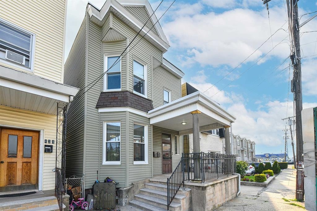 a view of a building with a porch