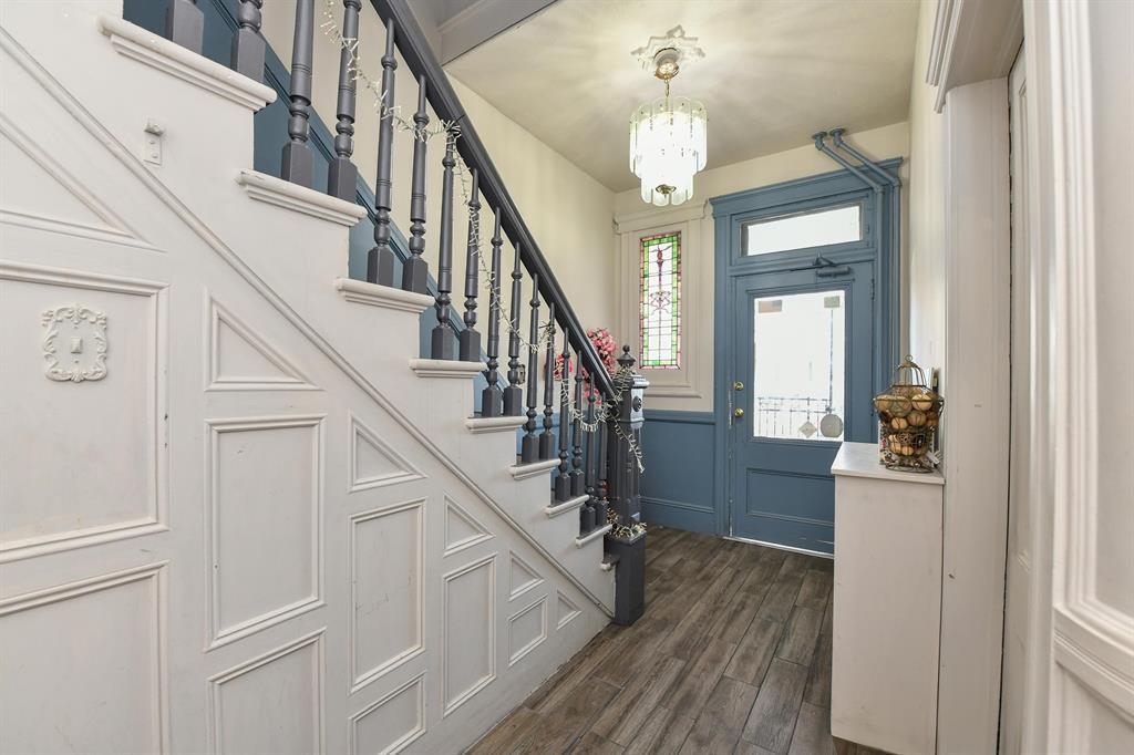 426 Hancock Place Fairview, NJ 07022 - Photo 11 of 14 a view of entryway and hall with wooden floor