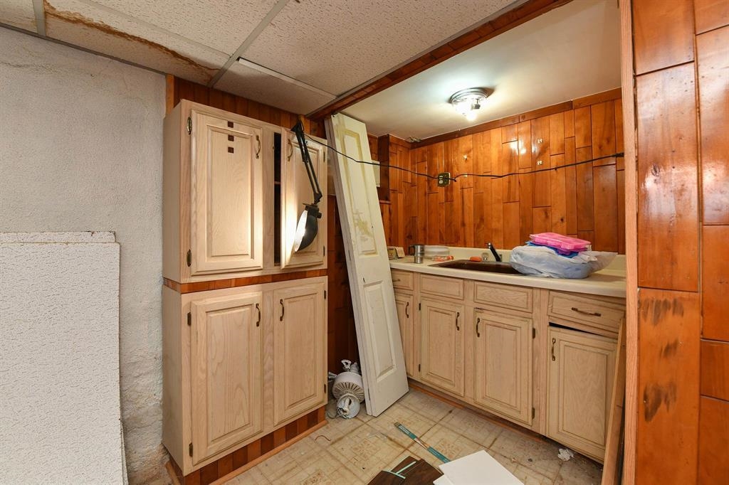426 Hancock Place Fairview, NJ 07022 - Photo 8 of 14 a bathroom with a granite countertop sink and a mirror