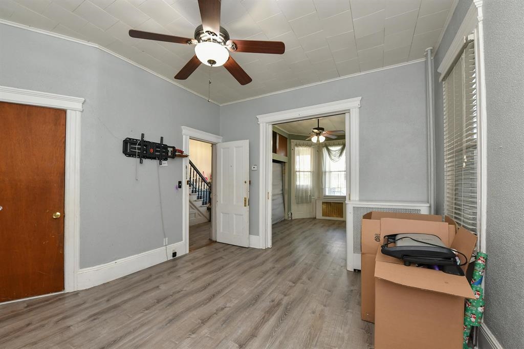 426 Hancock Place Fairview, NJ 07022 - Photo 10 of 14 a view of a livingroom with a furniture wooden floor and window