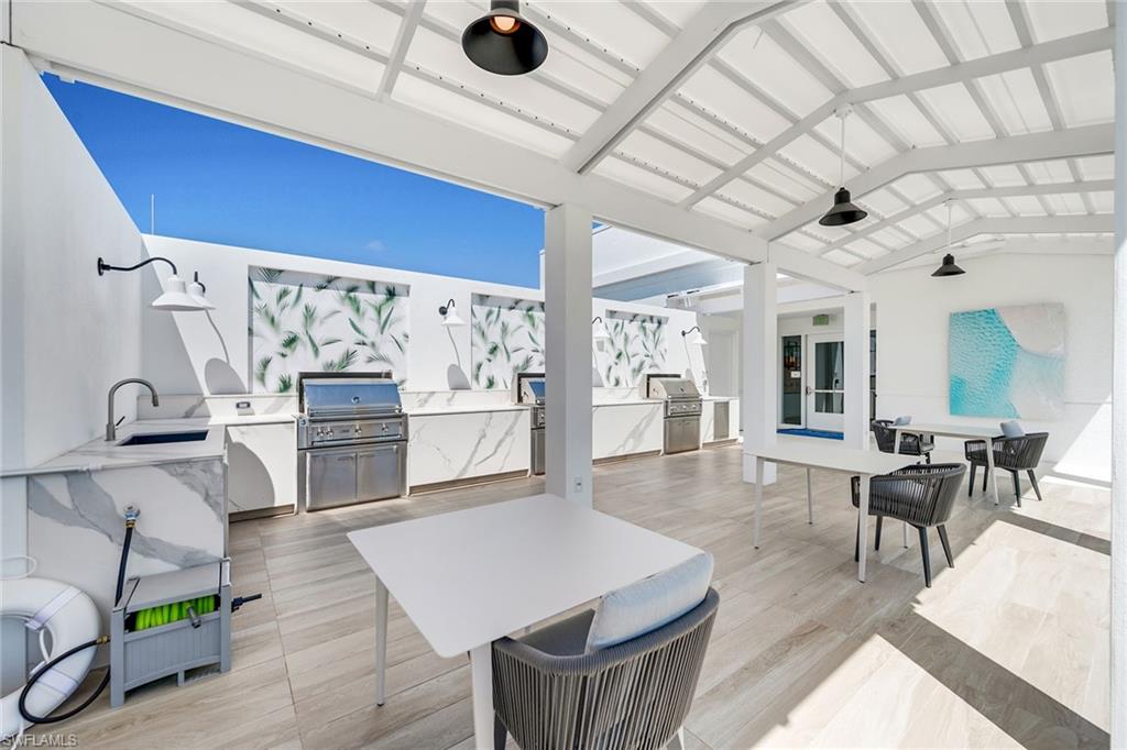 13945 Old Coast Road, Unit 1202 Naples, FL 34110 - Photo 33 of 46 BBQ Grill Area