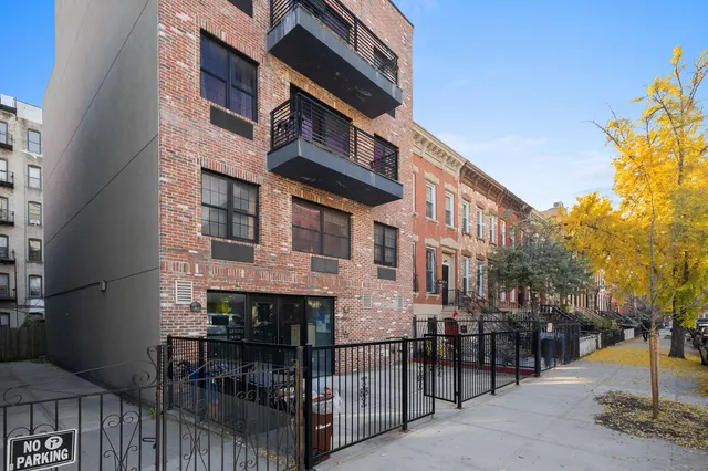 a view of a building with a street