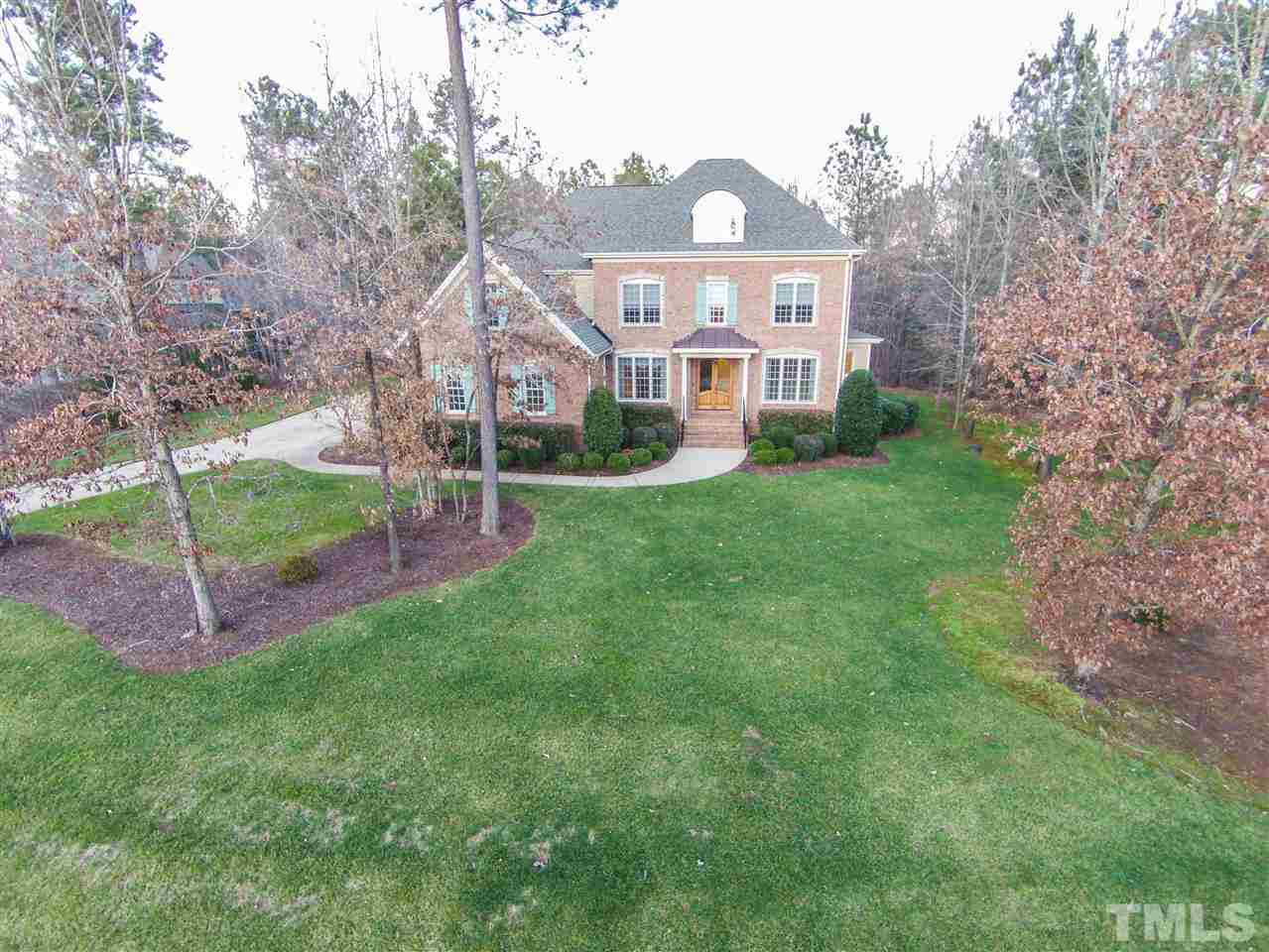 1068 Tacketts Pond Drive Raleigh, NC 27614 - Photo 1 of 25 Beautiful estate home with gorgeous hardwood floors, extensive molding, and transom doorways. Elegant formal rooms. Two story family room with gas log fireplace, lovely built-ins, and wall of architectural windows. Gourmet kitchen with large island, grani 1068 Tacketts Pond