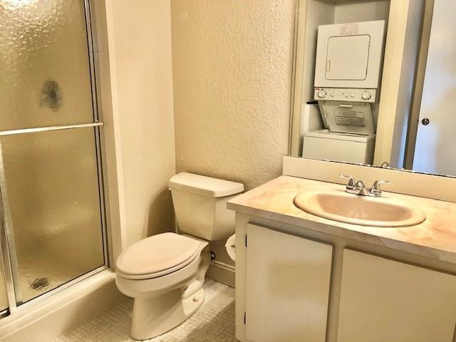 310 Racquet Club Road, Unit 203 Weston, FL 33326 - Photo 13 of 14 a bathroom with a sink a toilet and shower