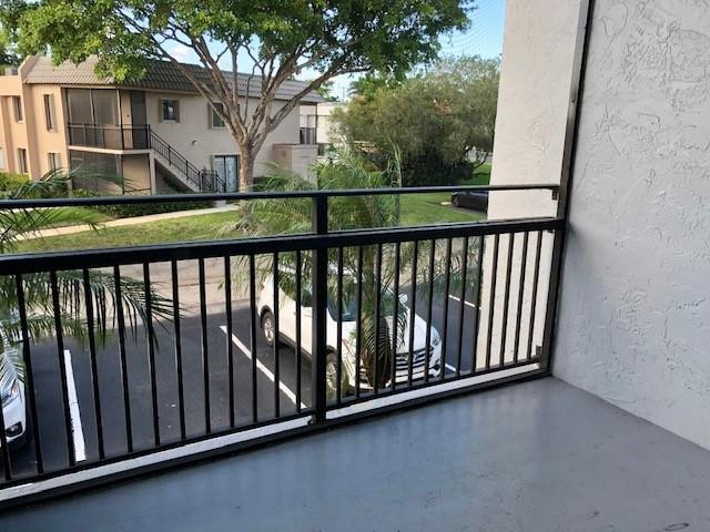 310 Racquet Club Road, Unit 203 Weston, FL 33326 - Photo 2 of 14 a view of balcony