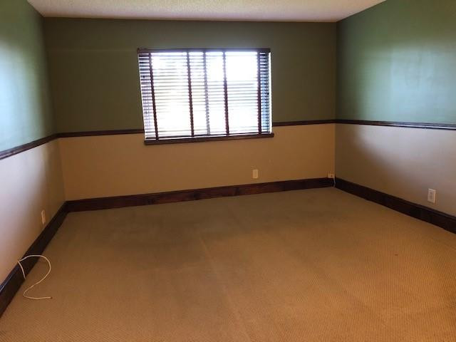 310 Racquet Club Road, Unit 203 Weston, FL 33326 - Photo 9 of 14 a view of an empty room with a window