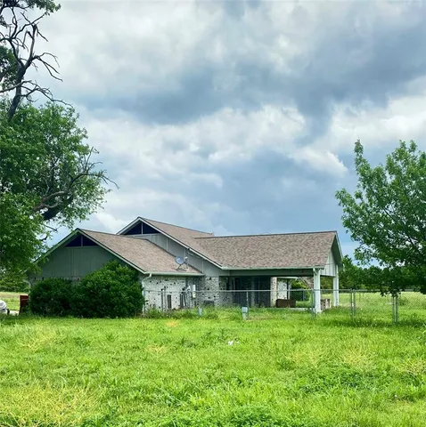 a house view with a garden space