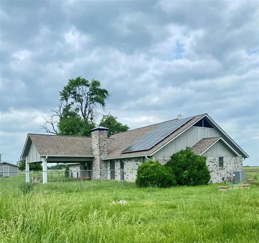 a house view with a garden space