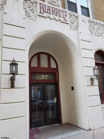 a close view of a fireplace and cabinets