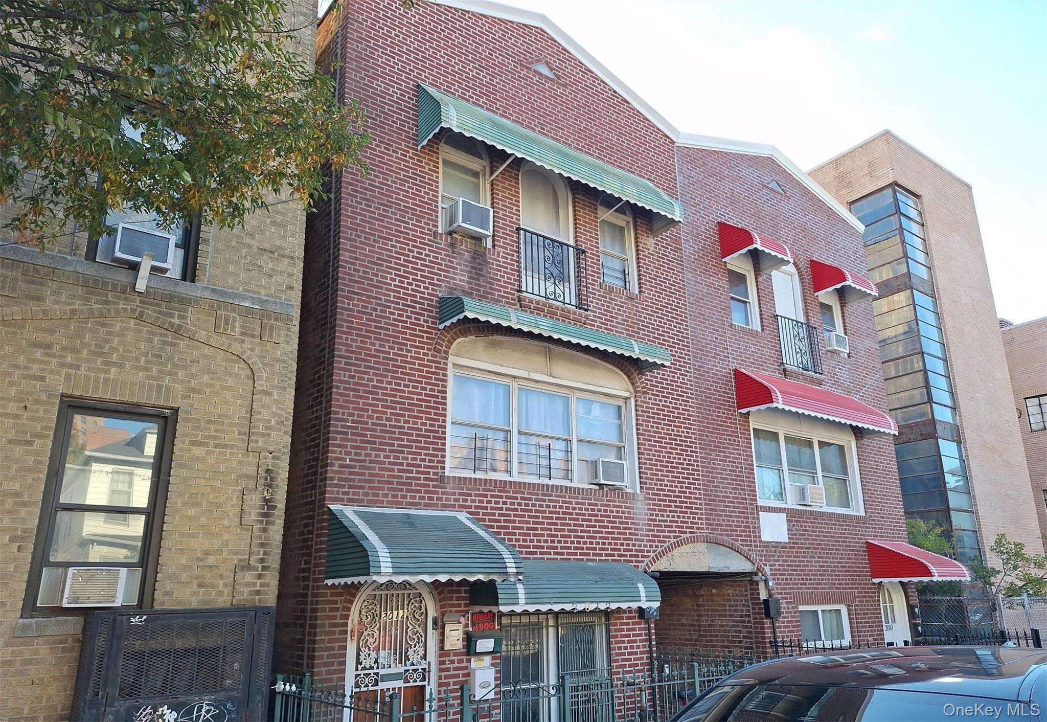 2012 Benedict Avenue Bronx, NY 10462 - Photo 2 of 4 a front view of a multi story residential apartment building