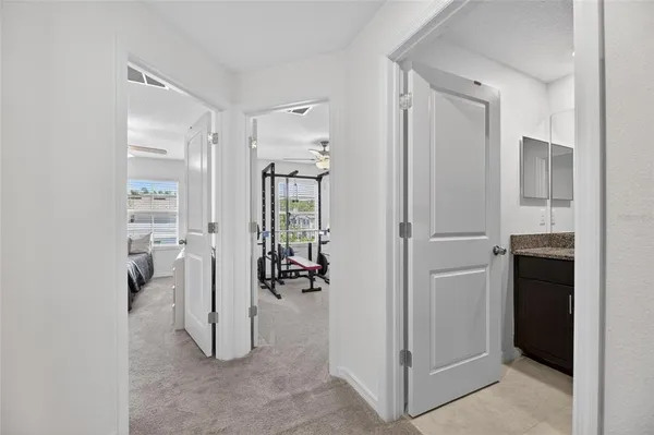 a bathroom with a sink toilet and mirror