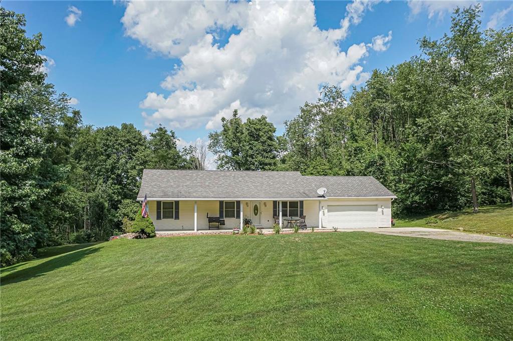 Custom built Ranch by McNary construction with just under 3 acres of almost level land on Cul-De-Sac Street. 