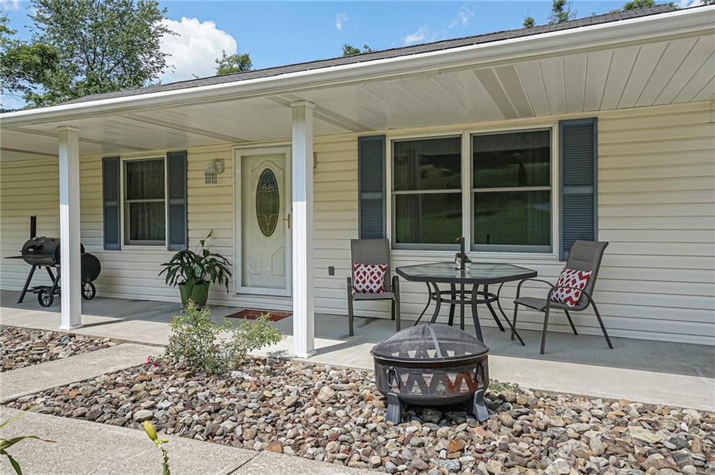 563 Leeper Road Georgetown, PA 15043 - Photo 2 of 25 Spacious covered front porch for meeting neighbors and morning coffee.