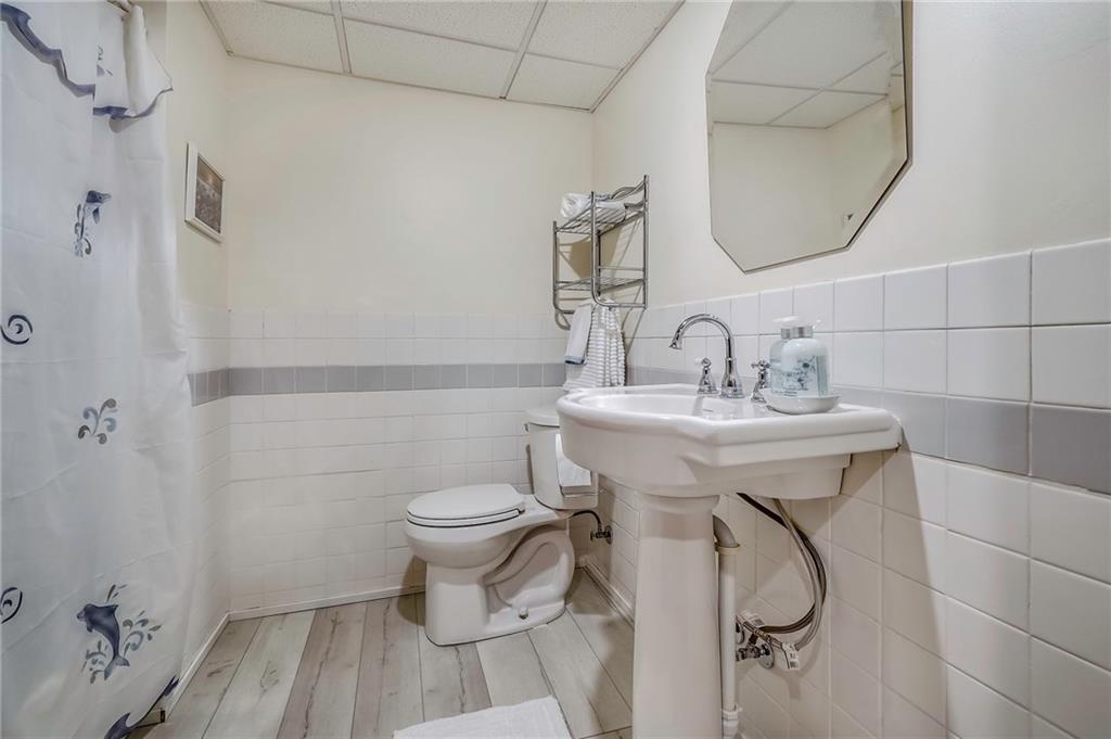563 Leeper Road Georgetown, PA 15043 - Photo 16 of 25 Beautiful updated full bath in lower level with neutral decor.