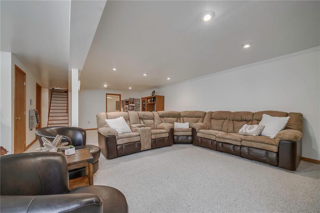 563 Leeper Road Georgetown, PA 15043 - Photo 18 of 25 Massive lower level Gameroom complete with wall to wall carpet and recessed lighting.