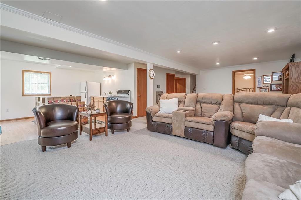 563 Leeper Road Georgetown, PA 15043 - Photo 19 of 25 Enjoy Monday night football with family and friends in the spacious and open concept Gameroom complete with a kitchenette.