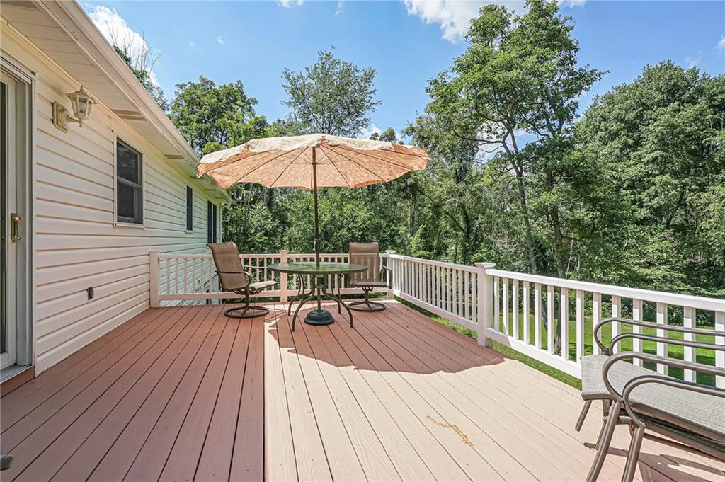 563 Leeper Road Georgetown, PA 15043 - Photo 21 of 25 vinyl (maintenance-free) railing and freshly painted back deck overlooking the private backyard.