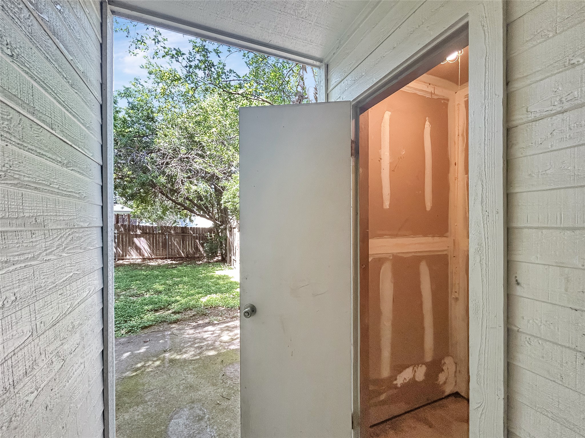 2008 Alex Avenue, Unit A Austin, TX 78728 - Photo 18 of 22 Back Door Leading to the Backyard