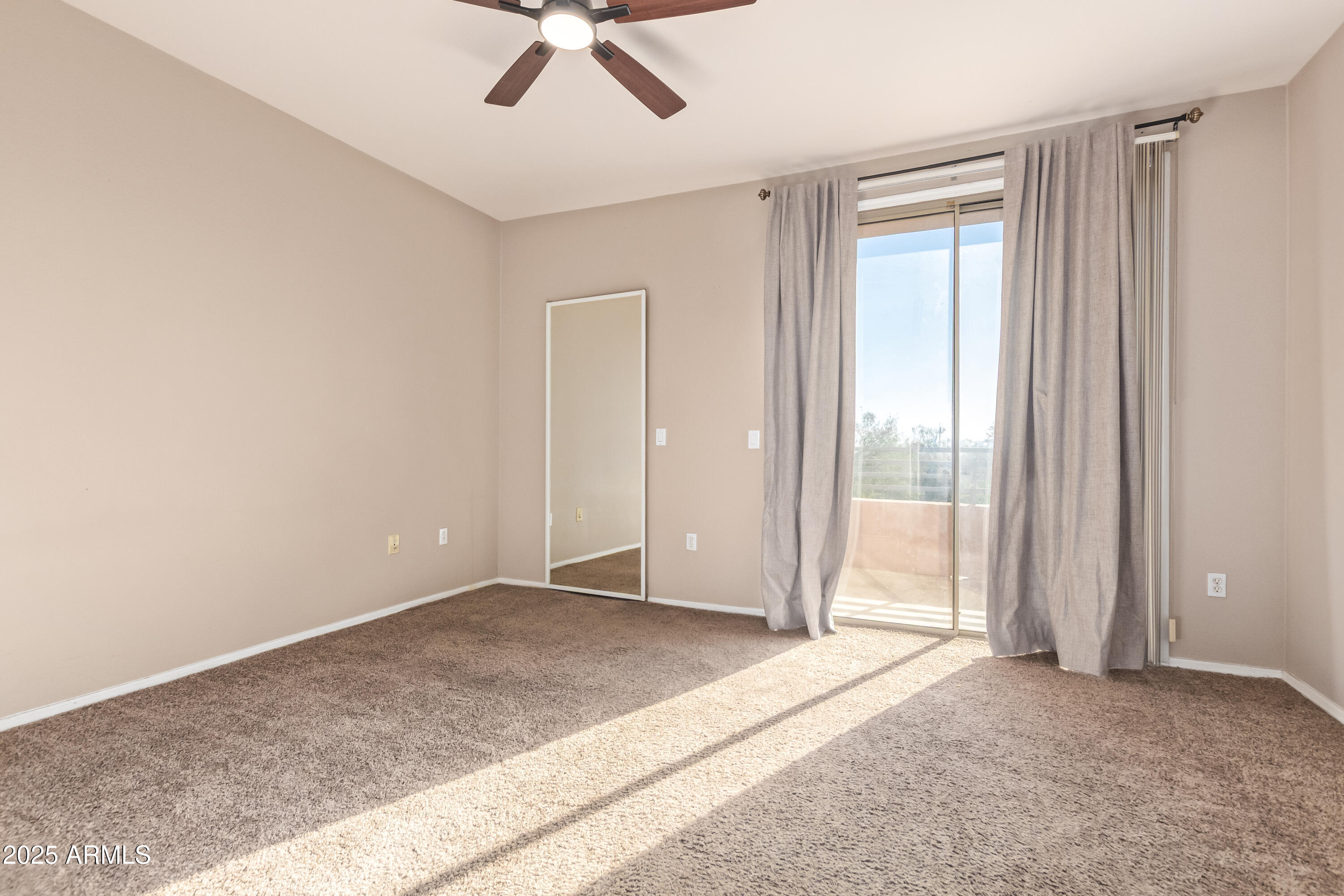 19777 North 76th Street, Unit 1337 Scottsdale, AZ 85255 - Photo 11 of 33 a view of an empty room and window