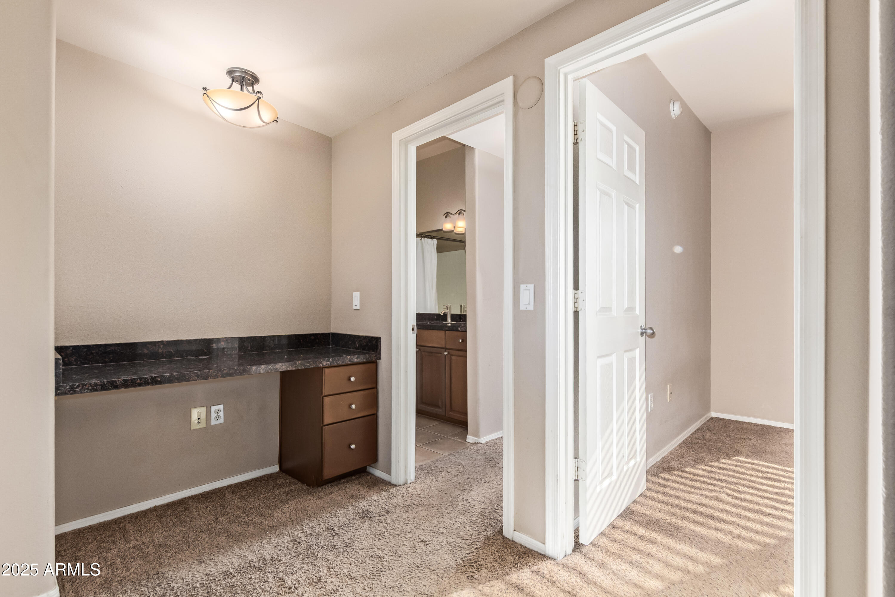 19777 North 76th Street, Unit 1337 Scottsdale, AZ 85255 - Photo 13 of 33 a view of an empty room with closet and mirror