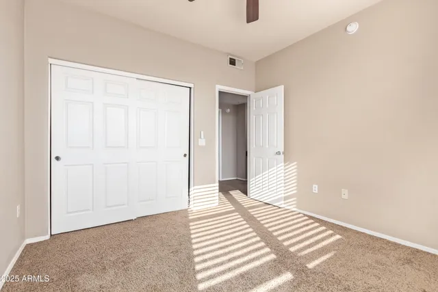 a view of an empty walk in closet