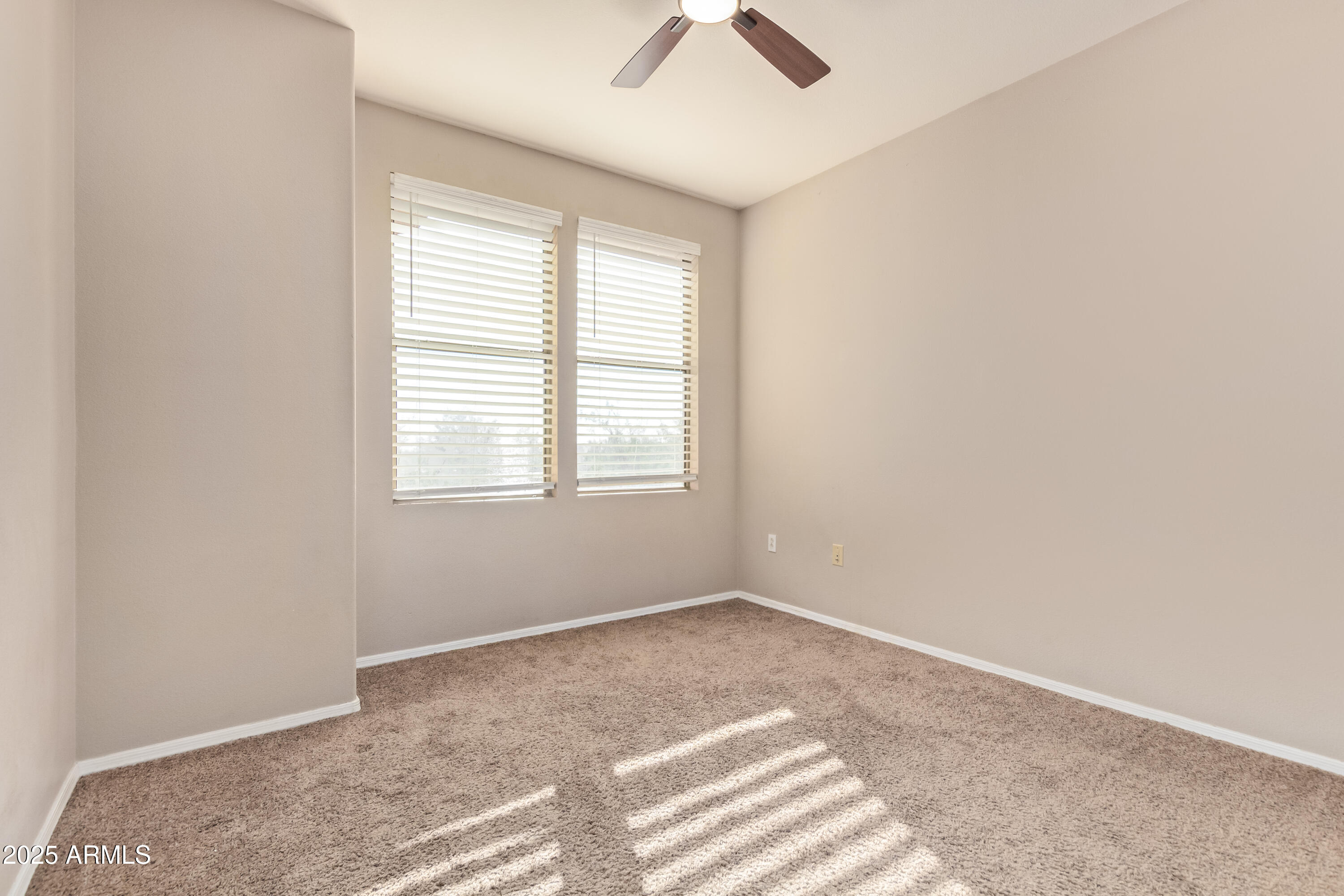 19777 North 76th Street, Unit 1337 Scottsdale, AZ 85255 - Photo 16 of 33 a view of an empty room with a window