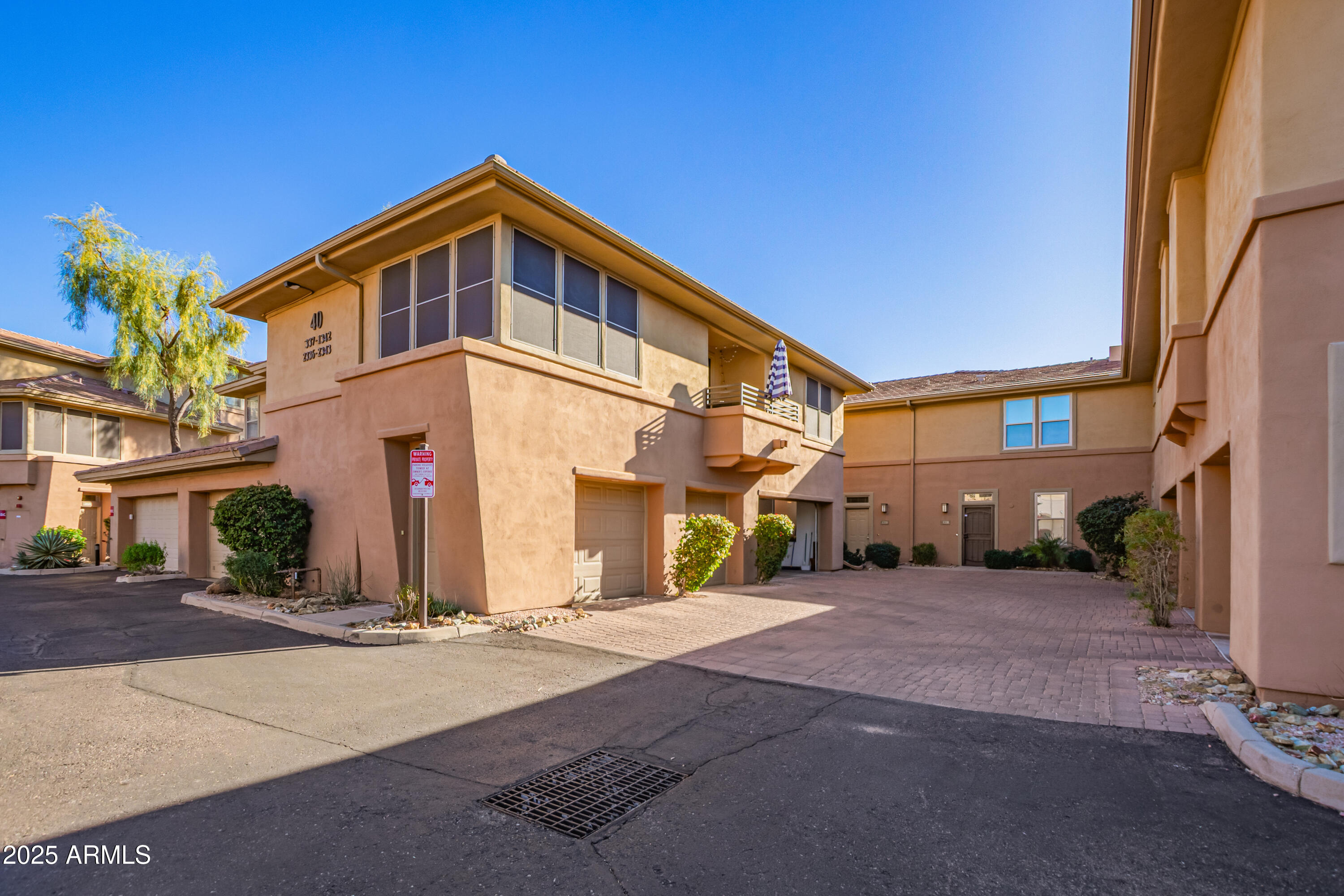 19777 North 76th Street, Unit 1337 Scottsdale, AZ 85255 - Photo 2 of 33 a view of a house with a street