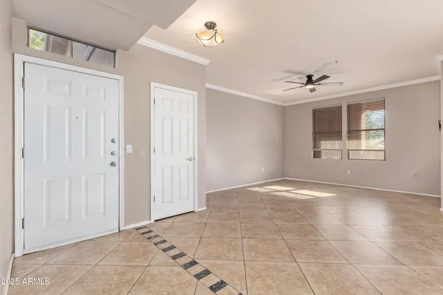 a kitchen with granite countertop a stove and a refrigerator
