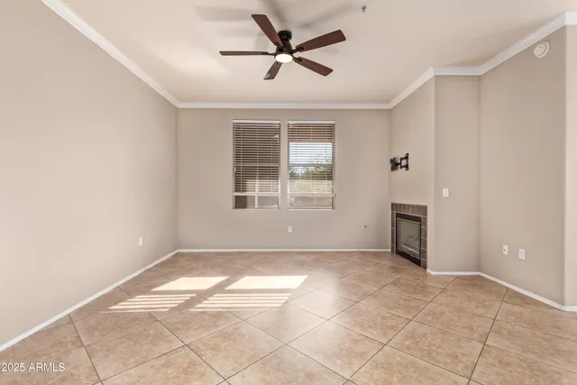 a view of an empty room and window