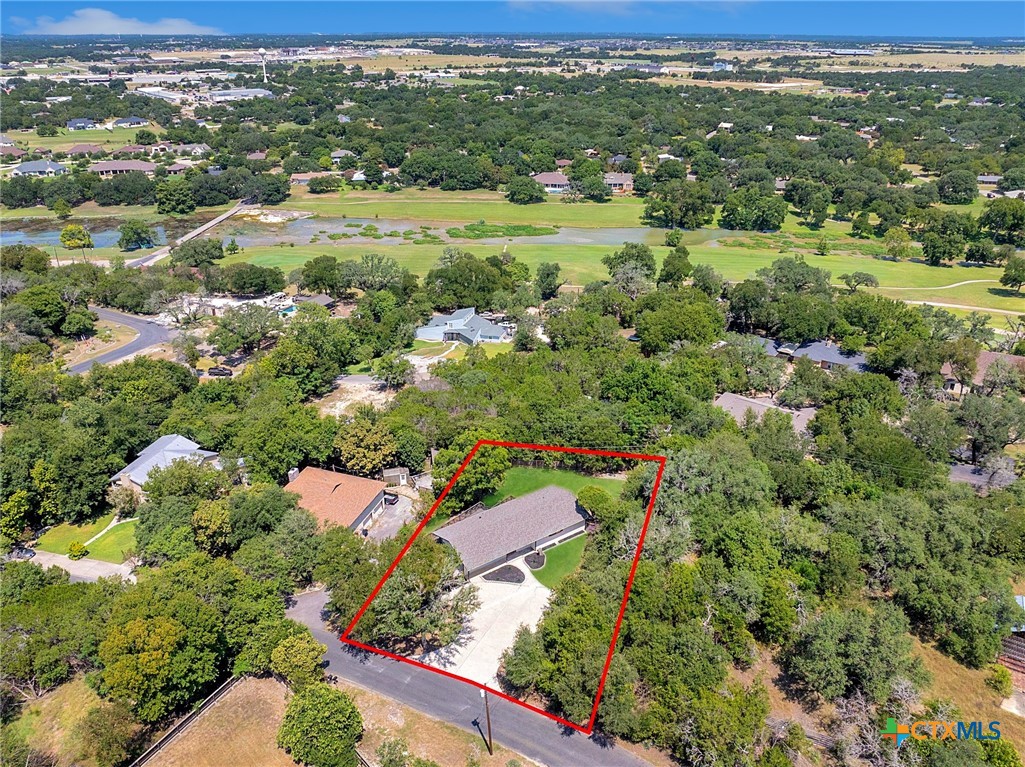 1120 Old Mill Road Salado, TX 76571 - Photo 37 of 42 an aerial view of residential houses with outdoor space and trees