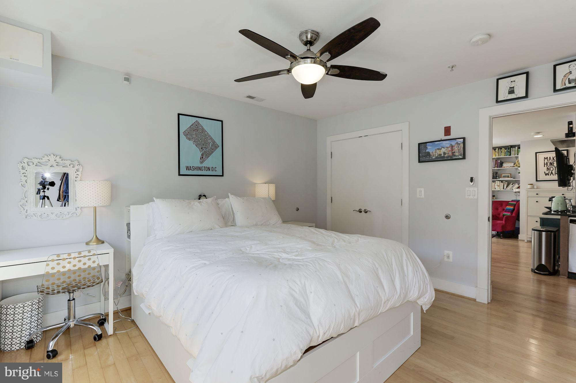 449 R Street Northwest, Unit 10 Washington, DC 20001 - Photo 12 of 23 a spacious bedroom with a bed and a table in it