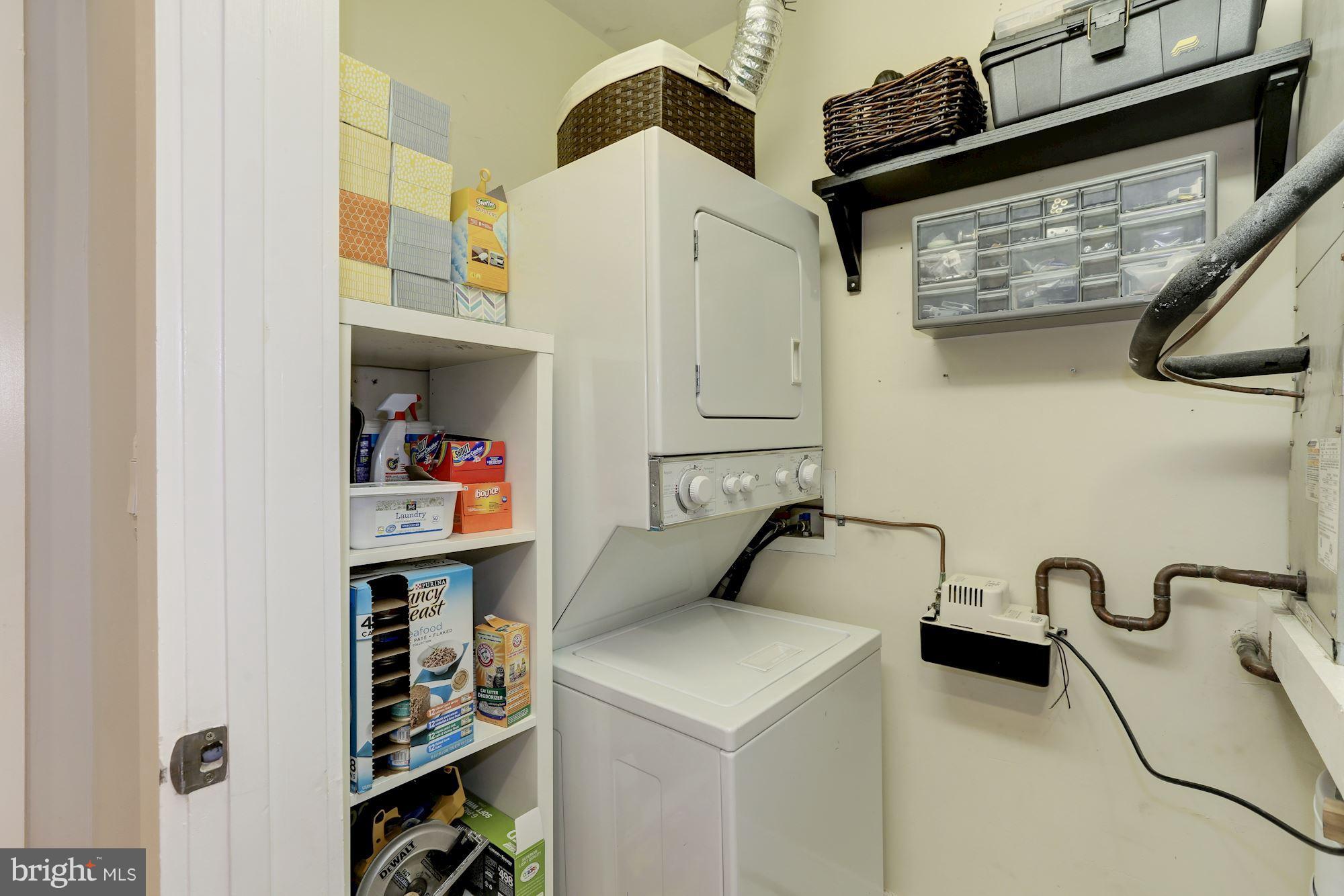 449 R Street Northwest, Unit 10 Washington, DC 20001 - Photo 16 of 23 a utility room with dryer and washer