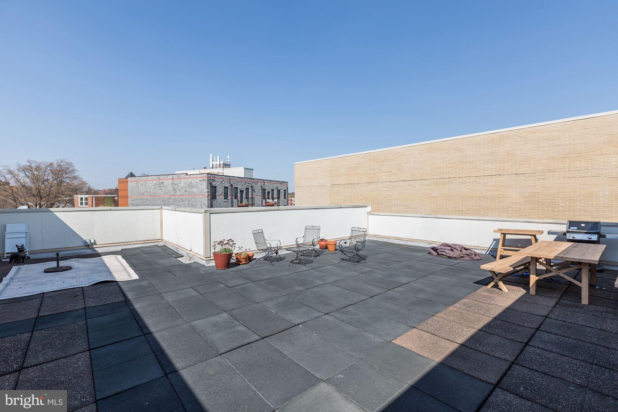 449 R Street Northwest, Unit 10 Washington, DC 20001 - Photo 20 of 23 a view of barbeque outdoor space with seating