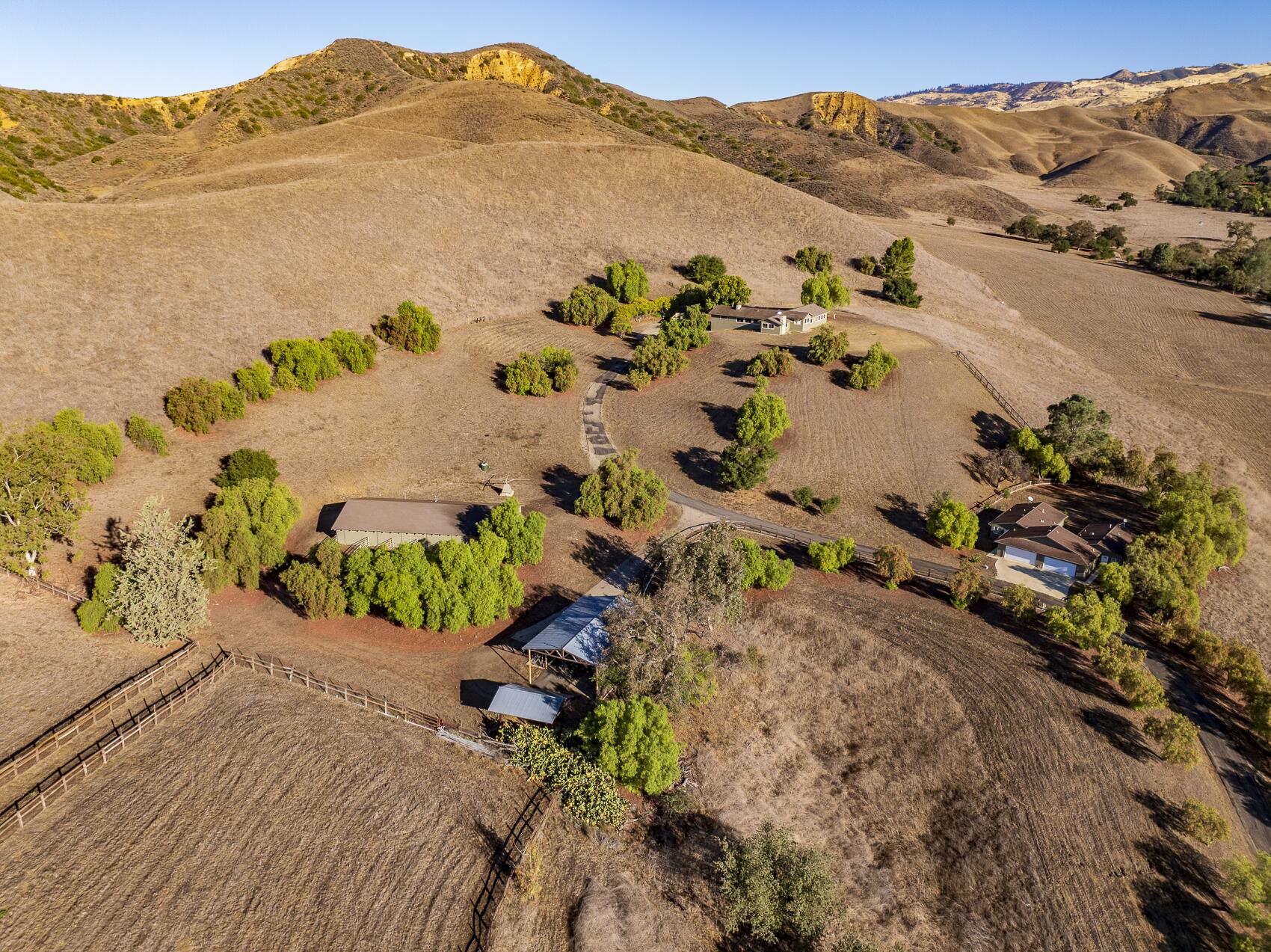 1959 Rambling Oaks Road Santa Ynez, CA 93460 - Photo 11 of 42 an aerial view of a house with a mountain